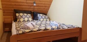 Posteľ alebo postele v izbe v ubytovaní Domek pod Antałówką