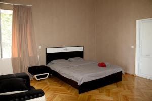 Ένα ή περισσότερα κρεβάτια σε δωμάτιο στο Sighnaghi Inn