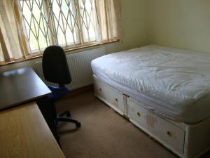 Tempat tidur dalam kamar di Draycott