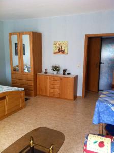 Postel nebo postele na pokoji v ubytování Ferienwohnungen und Appartements - Haus Budinger