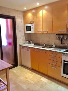 A kitchen or kitchenette at Dream Apartment in Estepona, Andalusia