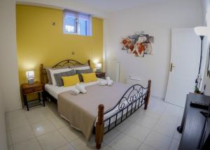 Posteľ alebo postele v izbe v ubytovaní Cozy Apartments near the airport