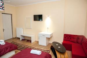 TV a/nebo společenská místnost v ubytování Hotel EDEA