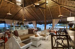 A restaurant or other place to eat at Cap Cana Luxurious Marina Condo