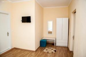 TV a/nebo společenská místnost v ubytování Hotel EDEA