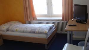 Televisor o centre d'entreteniment de Hotel Gotthard