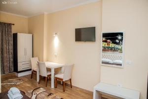 TV a/nebo společenská místnost v ubytování Hotel EDEA