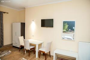 TV a/nebo společenská místnost v ubytování Hotel EDEA