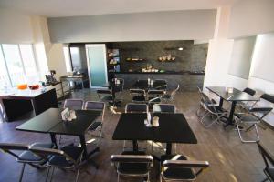 Restoran või mõni muu söögikoht majutusasutuses Hotel Tepic