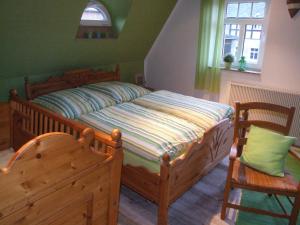 A bed or beds in a room at Schluchthäusl