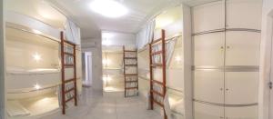 Cama ou camas em um quarto em Galinha d'Angola