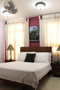 Rúm í herbergi á Hotel Solaris