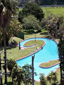 Loft particular - Palácio Quitandinha 부지 내 또는 인근 수영장 전경