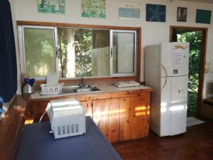 Kuchyň nebo kuchyňský kout v ubytování Casitas La Playa + 37 fotografií