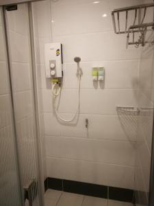 Koupelna v ubytování Pilly Homestay + 37 fotografií