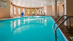 a large swimming pool with blue water at BEST WESTERN The Hotel Chequamegon in Ashland