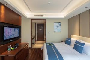 Yushan Town Tianji Cloud Business Hotel TV 또는 엔터테인먼트 센터