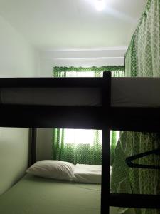 Postel nebo postele na pokoji v ubytování Gaea's Apartments