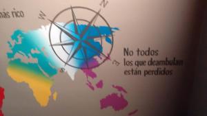 a map of the world with a rainbow at Sol-O-Cien Condo in Rosarito