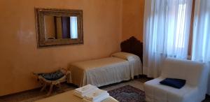 Postel nebo postele na pokoji v ubytování BB Venezia
