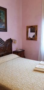 Postel nebo postele na pokoji v ubytování BB Venezia