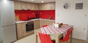 A kitchen or kitchenette at Rodoula Luxury Αpartment 2