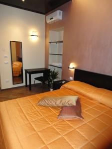 Posteľ alebo postele v izbe v ubytovaní B&B Il Campanile