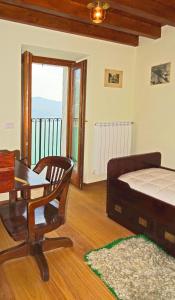 Postel nebo postele na pokoji v ubytování Casa De Pol Exclusive Lake View by Gardadomusmea