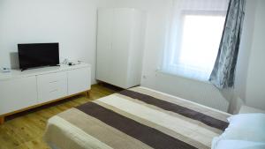 Postel nebo postele na pokoji v ubytování Elena Haus