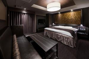 A bed or beds in a room at N Hotel
