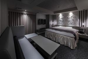 A bed or beds in a room at N Hotel