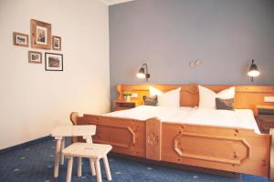 Postel nebo postele na pokoji v ubytování Bavaria Biohotel