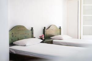 Posteľ alebo postele v izbe v ubytovaní Corfu 9 Muses Ipsos