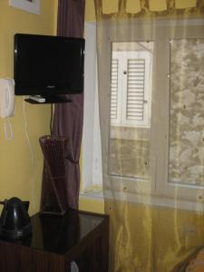Televízia a/alebo spoločenská miestnosť v ubytovaní Split Central Guesthouse