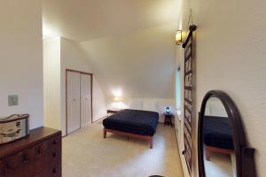 Llit o llits en una habitació de Jewel Chalet