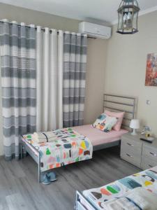Cama o camas de una habitación en Petro’s Apartment