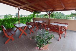 Balkon lub taras w obiekcie Aranypatkó Fogadó-Étterem