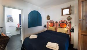 A bed or beds in a room at Casa 34 Dicembre