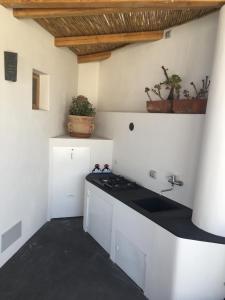 A kitchen or kitchenette at Casa 34 Dicembre
