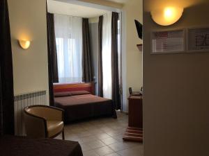 Postel nebo postele na pokoji v ubytování Hotel Brenta Milano