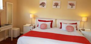 Postel nebo postele na pokoji v ubytování African Breeze Guesthouse