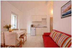 Η κουζίνα ή μικρή κουζίνα στο Apartments Pralija