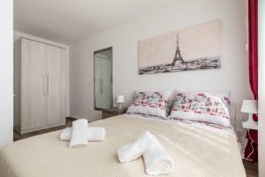 Postel nebo postele na pokoji v ubytování Apartments Cezar