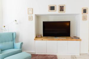 TV a/nebo společenská místnost v ubytování Luxury Suite Corso Umberto
