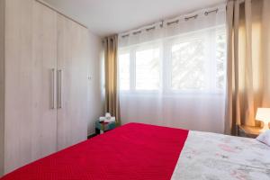 Postel nebo postele na pokoji v ubytování Apartments Cezar