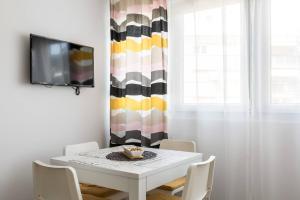 TV a/nebo společenská místnost v ubytování Apartments Cezar