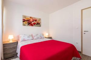 Postel nebo postele na pokoji v ubytování Apartments Cezar