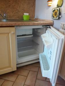 A kitchen or kitchenette at Amber Apartment