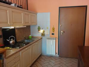 A kitchen or kitchenette at Amber Apartment