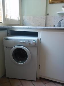 A kitchen or kitchenette at Amber Apartment
